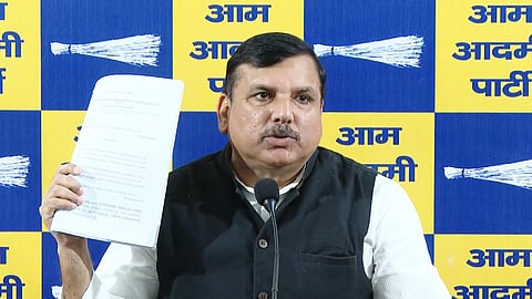 Sanjay Singh addressing a press conference at the party's headquarters