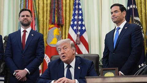 President Donald Trump speaks as Secretary of State Marco Rubio, right, and Vice President JD Vance listen in the Oval Office at the White House, Thursday, April 23, 2026, in Washington.