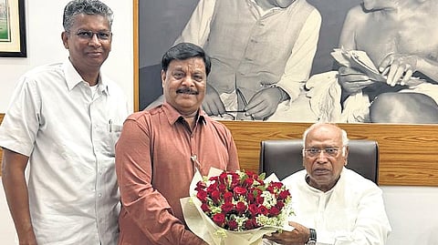 PWD Minister Satish Jarkiholi and Social Welfare Minister H C Mahadevappa meet AICC president Mallikarjun Kharge in New Delhi on Monday.  