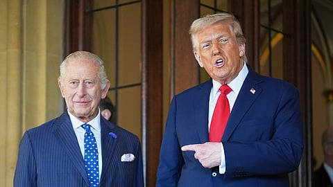 President Donald Trump gestures next to Britain's King Charles III before leaving Windsor Castle, Windsor, England, Sept. 18, 2025. 