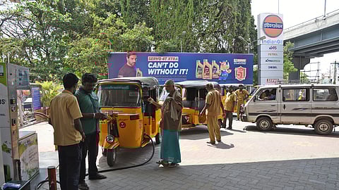 Autos waiting in a long queue at an LPG station in Tiruchy. 