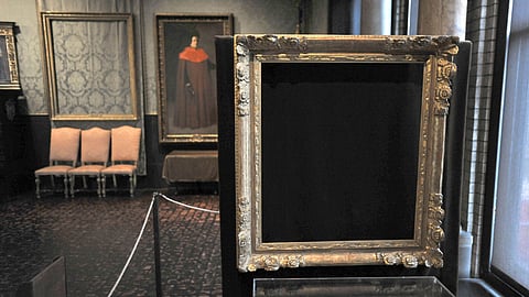 Empty frames from which thieves took "Storm on the Sea of Galilee," left background, by Rembrandt and "The Concert," right foreground, by Vermeer, remain on display at the Isabella Stewart Gardner Museum in Boston, n this Thursday, March 11, 2010.