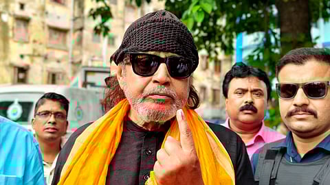 BJP leader Mithun Chakraborty shows his ink-marked finger after casting his vote during the second phase of the West Bengal Assembly elections in Kolkata, Wednesday, April 29, 2026. 
