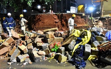 The spot where a compound wall collapsed and seven people died near Bowring Hospital due to heavy rain in Bengaluru.