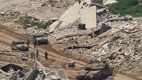 Israeli soldiers operate in southern Lebanon, as seen from northern Israel, Wednesday, April 29, 2026.