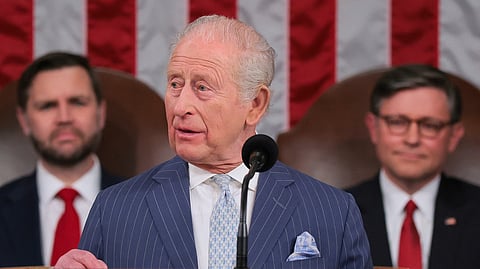 US Vice President JD Vance and House Speaker Mike Johnson listen as Britain's King Charles III speaks to a Joint Meeting of Congress in the House Chamber at the US Capitol in Washington, DC, on April 28, 2026.