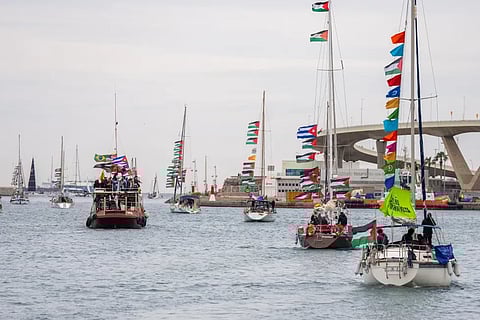 Boats carrying activists and humanitarian aid for Palestinians in Gaza reposition in the port during a symbolic send-off as part of the Global Sumud Flotilla, in Barcelona, Spain, Sunday, April 12, 2026. 