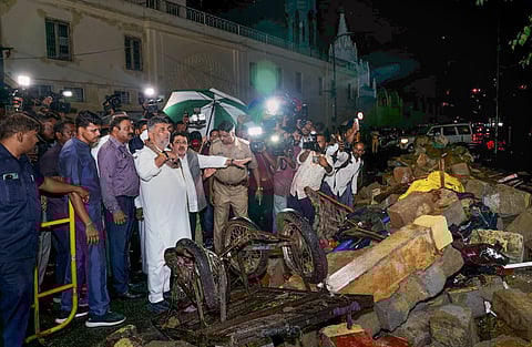 Karnataka Deputy Chief Minister DK Shivakumar visits the site of a wall collapse following heavy rain, at Bowring Hospital, in Bengaluru.