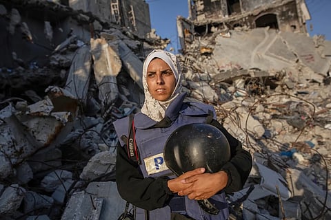 Freelance journalist Mariam Dagga, 33, who had been working with the Associated Press and other outlets during the Gaza war, poses for a portrait in Khan Younis, southern Gaza Strip, on June 14, 2024. 