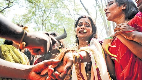 Transwomen, who symbolically tied the thali the previous day, observe widowhood rituals and mourn Lord Aravan’s death at Koovagam on Wednesday.