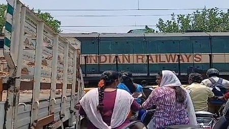 The road users waiting at railway crossing at second gate at Mellur in Thoothukudi town.