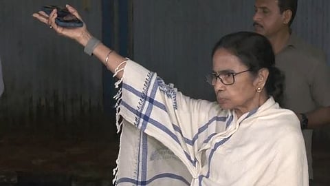 West Bengal Chief Minister Mamata Banerjee addressing reporters after exiting strongroom.