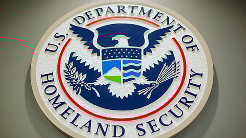 FILE - The Department of Homeland Security logo during a news conference in Washington, Feb. 25, 2015