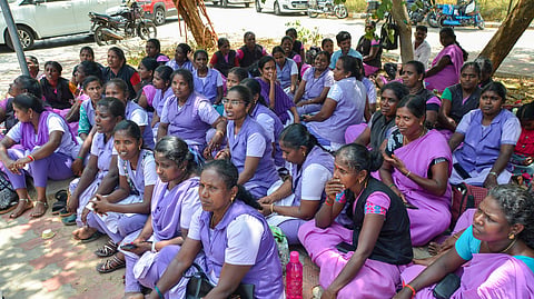 On International Workers' Day, temporary contract workers at Tirunelveli Government Medical College Hospital staged a protest.