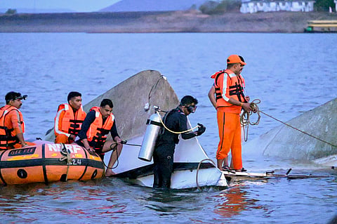 Rescue operation underway after a cruise boat with 29 passengers and two crew members onboard overturned in the Bargi Dam due to a sudden storm, in Jabalpur district, Madhya Pradesh, Friday, May 1, 2026. The death toll rose to nine and five more persons were rescued after the incident. 