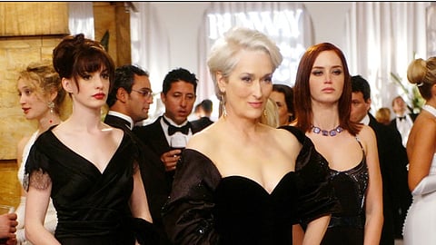 This scene from the first instalment captures Miranda Priestly, Andy Sachs and Emily Charlton at a high-stakes charity benefit