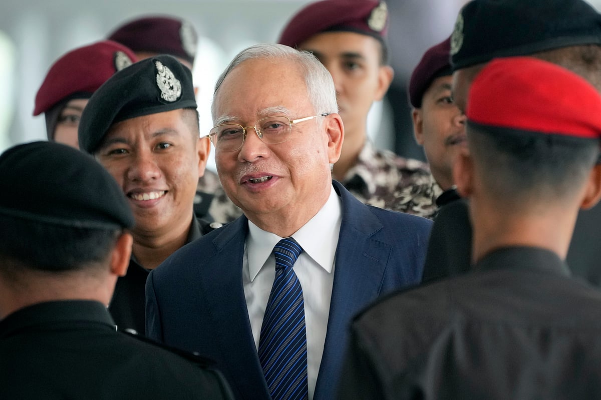 Malaysian court drops money laundering charges against jailed ex-PM ...