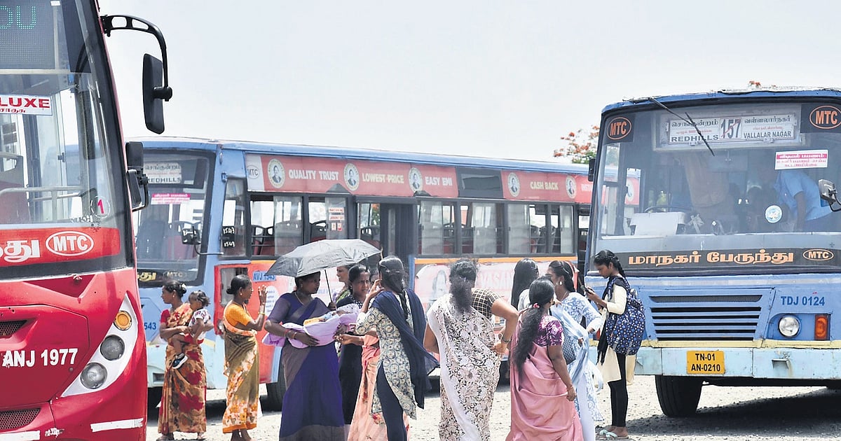 Bereft of cover, people face the elements at Redhills bus stand