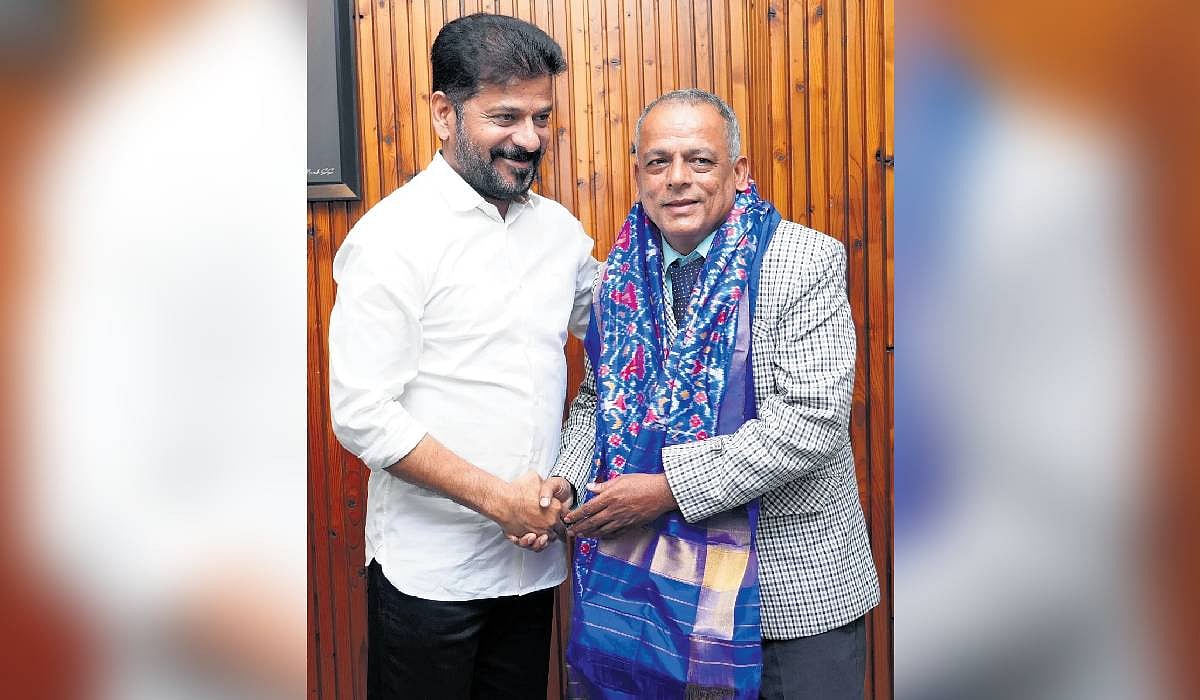 CM Revanth Reddy felicitates Kargil War hero Col Joy Dasgupta