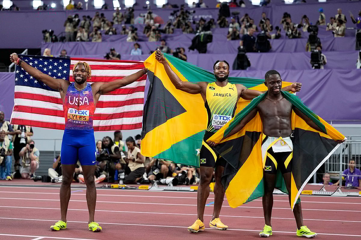 Oblique Seville joins Bolt as a Jamaican sprint champ; Jefferson-Wooden wins gold for US